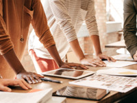 People discussing at a table