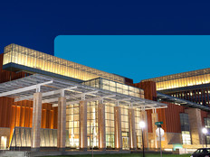 A college building illuminated at night