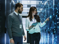 IT leader receives guidance in server room for network upgrades