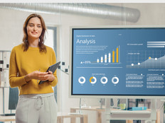 Woman uses data analytics to inform team of IT leaders