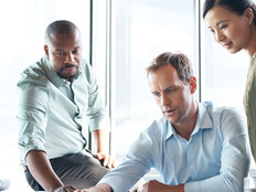 Co-workers collaborating in the office